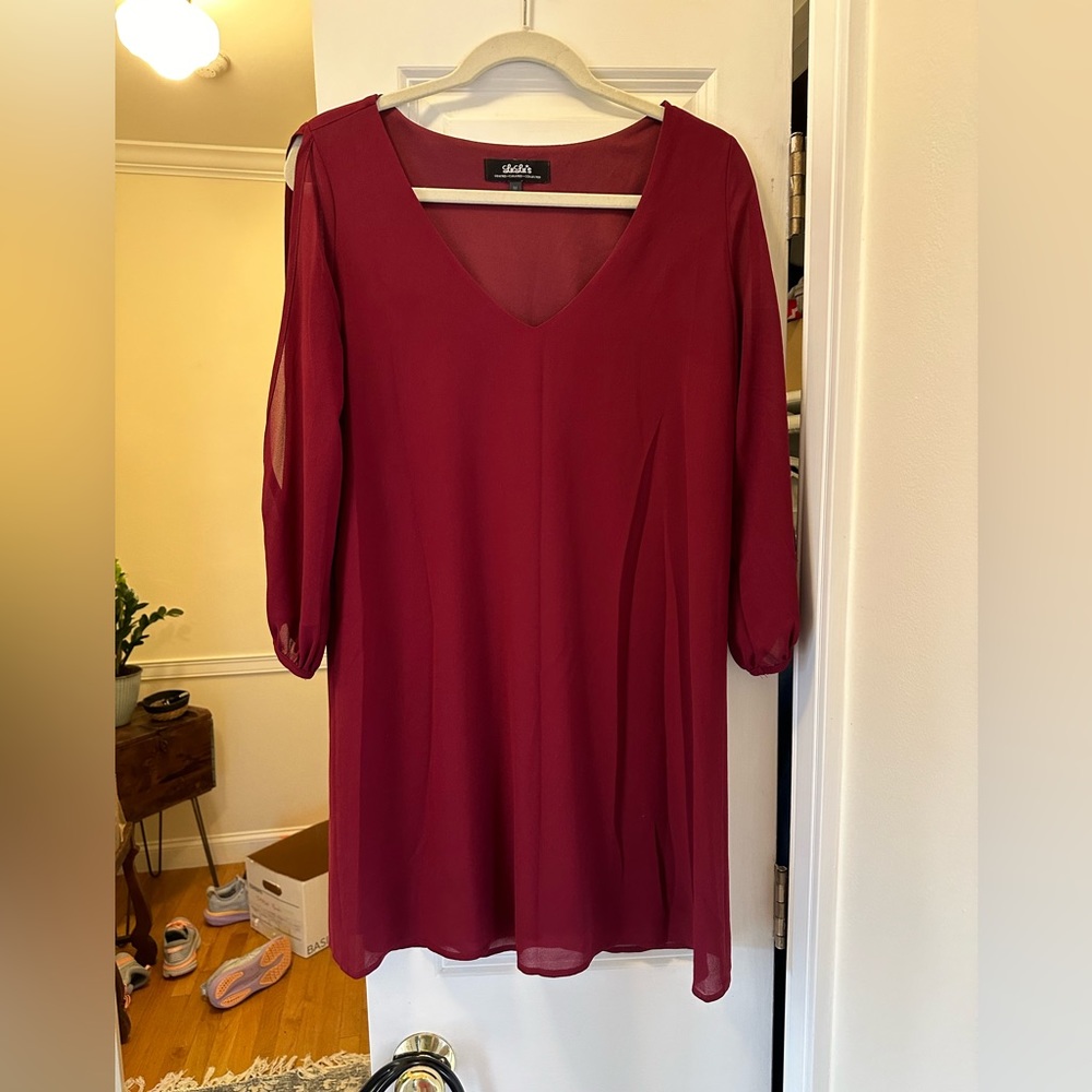 Deep red long sleeved midi dress with arm slits from Lulus. Only worn once!